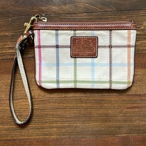 Coach wristlet with leather strap